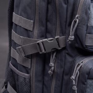 Close-up of a side compression strap and its quick-release buckle