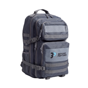 Beyond Peptides Gym Backpack at an angle, showing the front pockets and the MOLLE webbing along one side