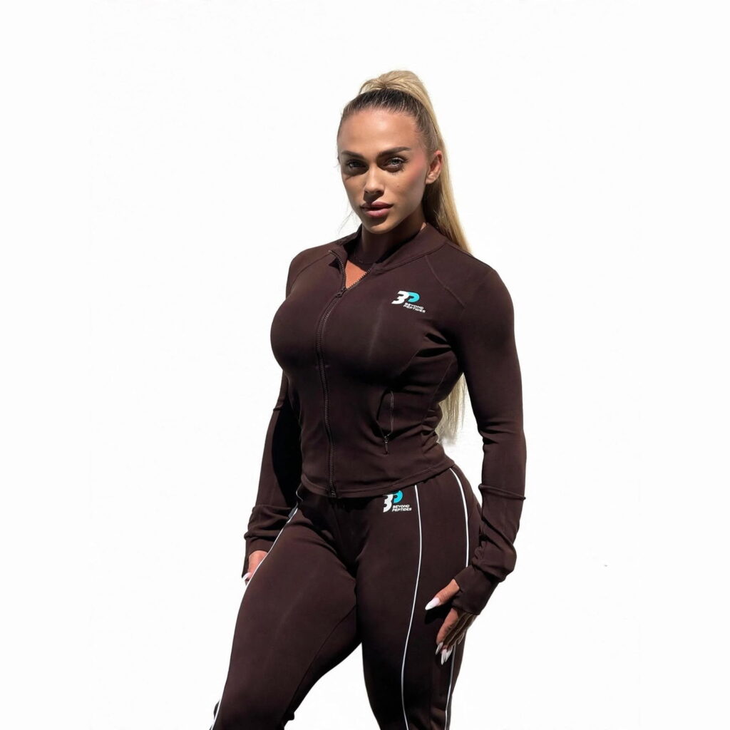 Beyond Peptides women's tracksuit in dark brown, three-quarter front view