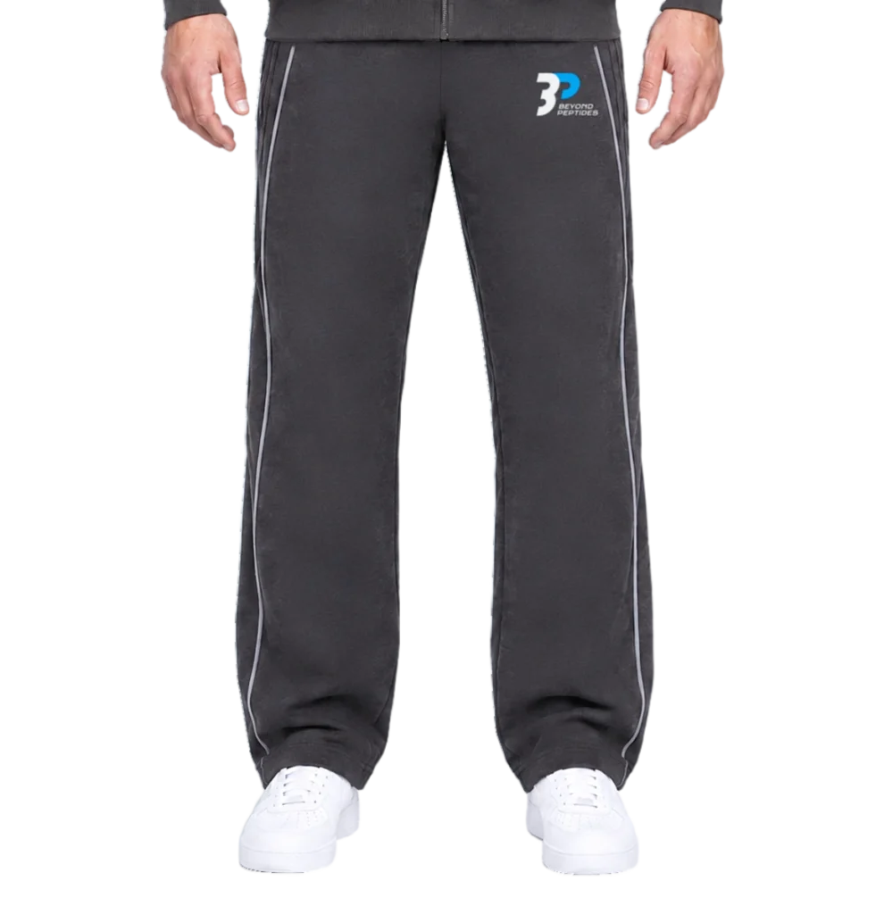 Grey Unisex Jogger on a model, front view from the waistband to the shoes