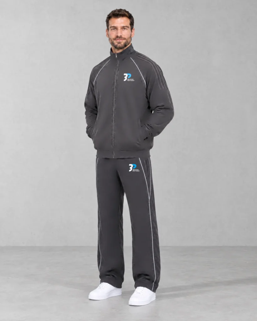 Model in the Grey Unisex Jogger and Grey Unisex Zipper in a studio