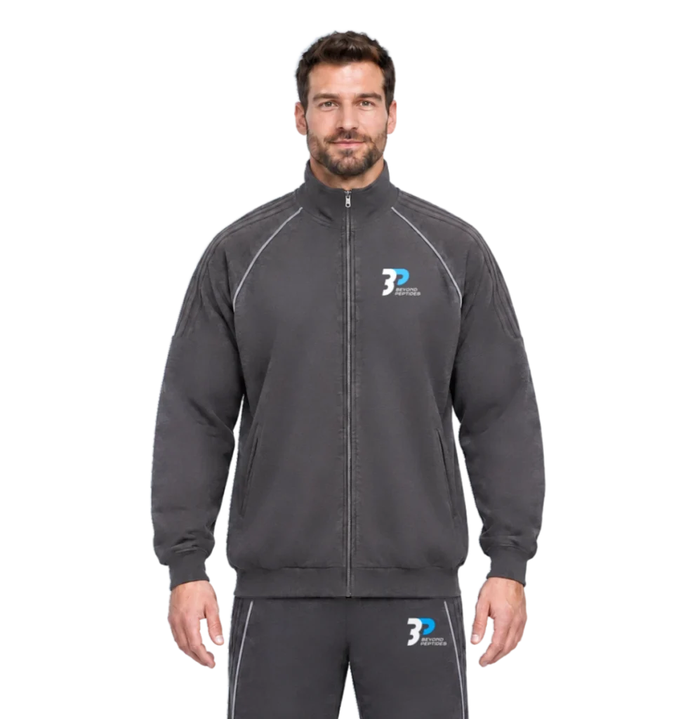 Model wearing the Grey Unisex Zipper with the matching jogger, front view